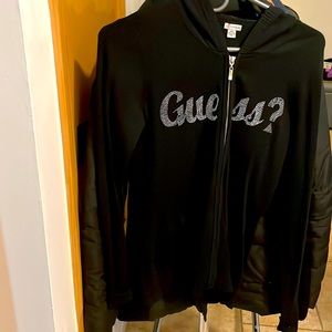 Super cute and fitted light guess sweater/jacket  for a cool day or evening.
